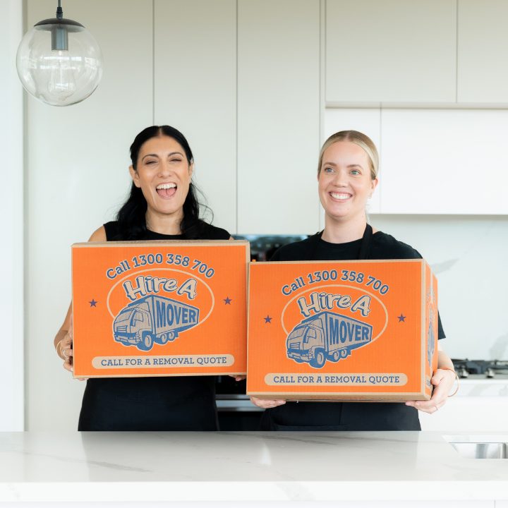 Image of Packers holding boxes