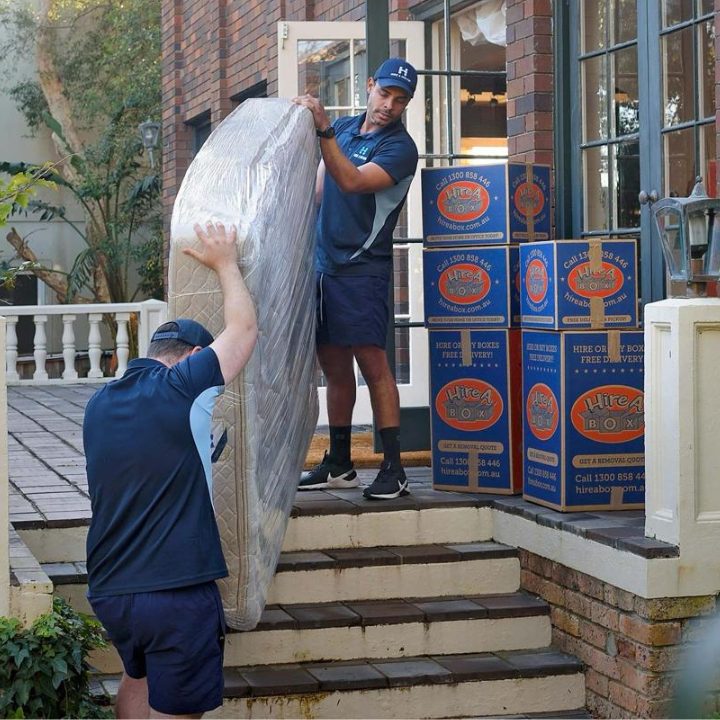 Image of Team moving a mattress