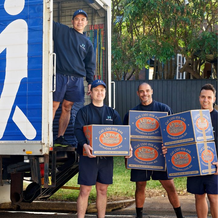 Image oc Moving team with boxes in front of truck