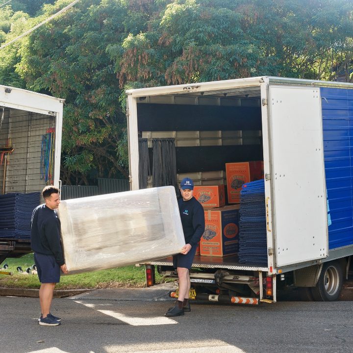 Image of Moving mattress into truck